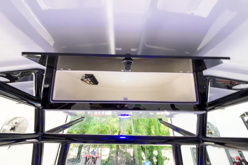 Slide: The Image of 2026 Sea Chaser 22 HFC boat interior storage compartment with sleek design and modern features. - 18