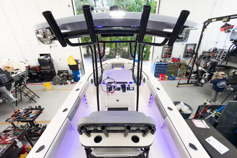 Slide: The Image of 2026 Sea Chaser 22 HFC boat interior in a workshop setting. - 22