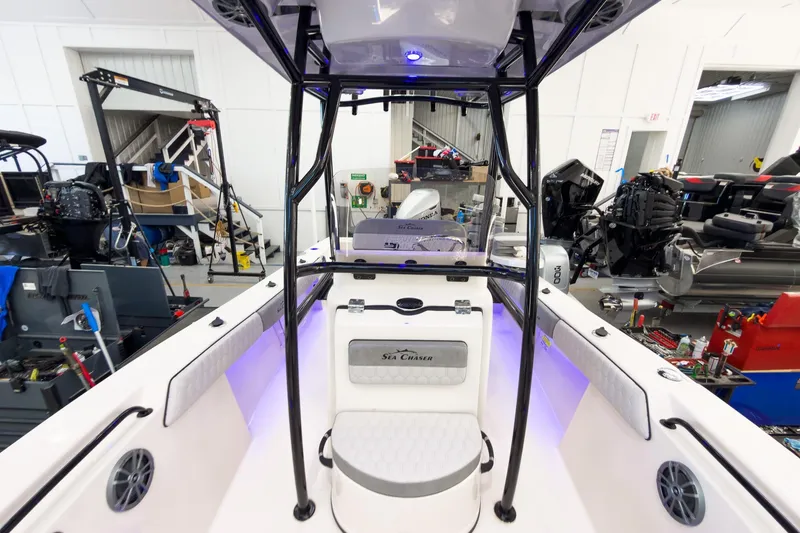 Slide: The Image of 2026 Sea Chaser 22 HFC boat interior in a workshop setting. - 30