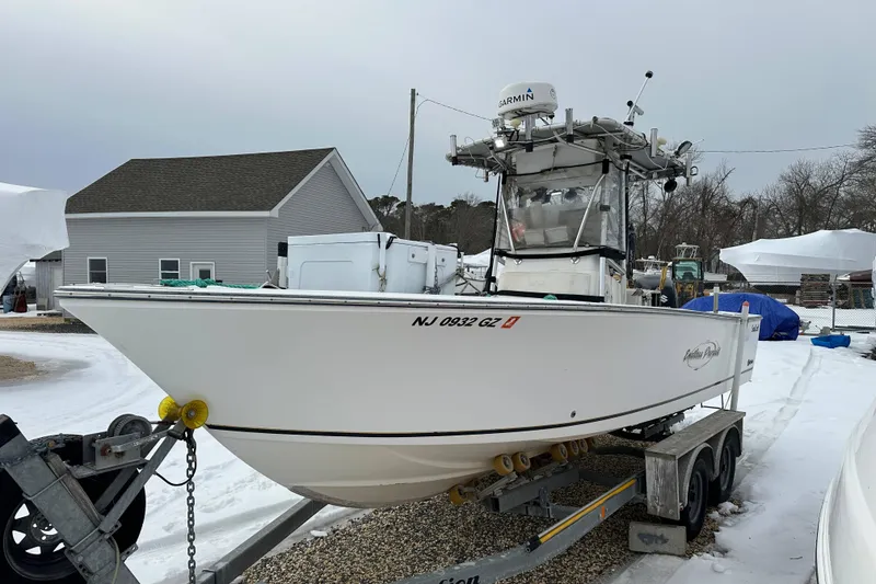 The Image of 2007 SeaCraft SC 23 Classic boat on trailer in snowy yard. - 0