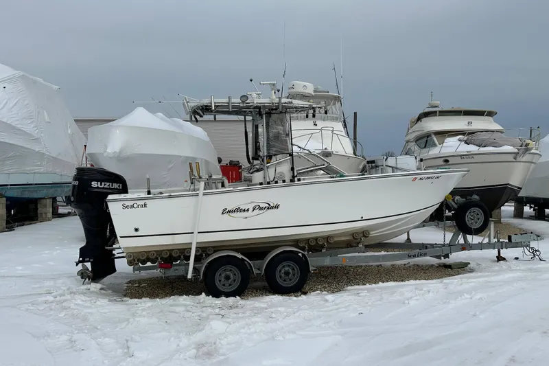 Slide: The Image of 2007 SeaCraft SC 23 Classic boat in storage yard with other vessels. - 9