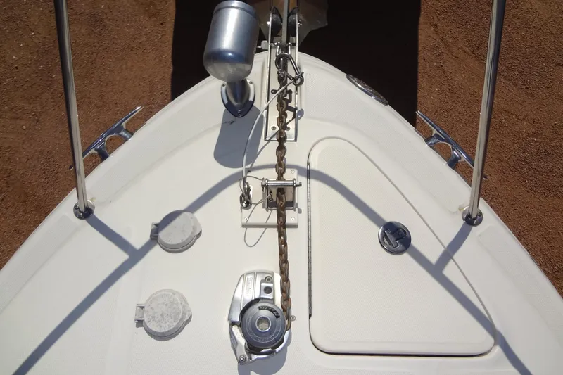 Slide: The Image of Bow of 2002 Sea Ray Sundancer 280 with anchor chain and deck fittings. - 11