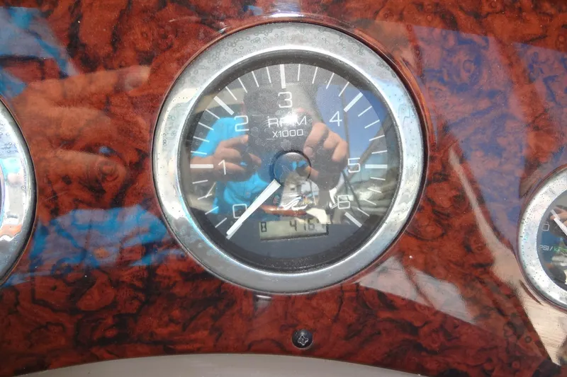 Slide: The Image of Tachometer of 2002 Sea Ray Sundancer 280 boat, showing RPM and hours. - 25
