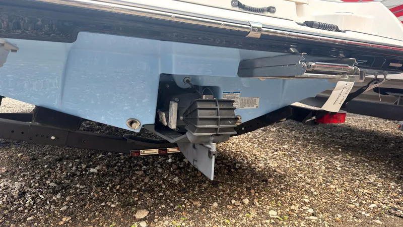 Slide: The Image of Close-up of a Yamaha SX195 boat's stern with drive unit and trailer. - 3