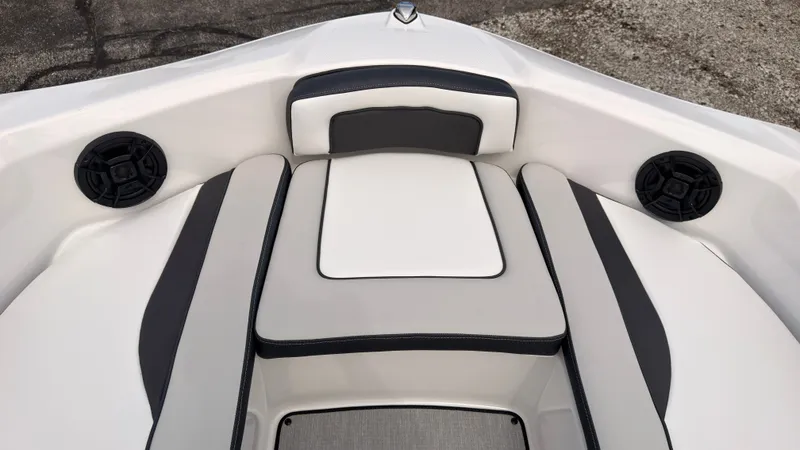 Slide: The Image of The bow of a Yamaha SX195 boat with cushioned seating and speakers. - 37