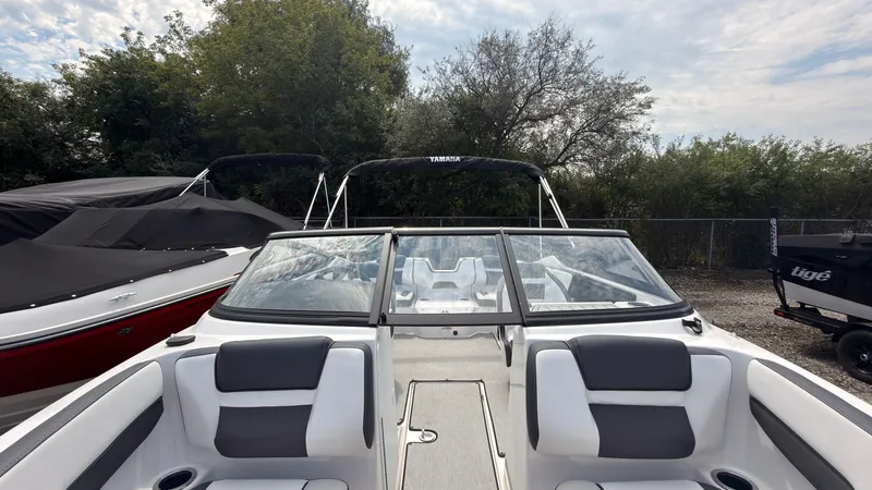 Slide: The Image of The image shows the cockpit of a Yamaha SX195 boat with gray and white seating. - 41