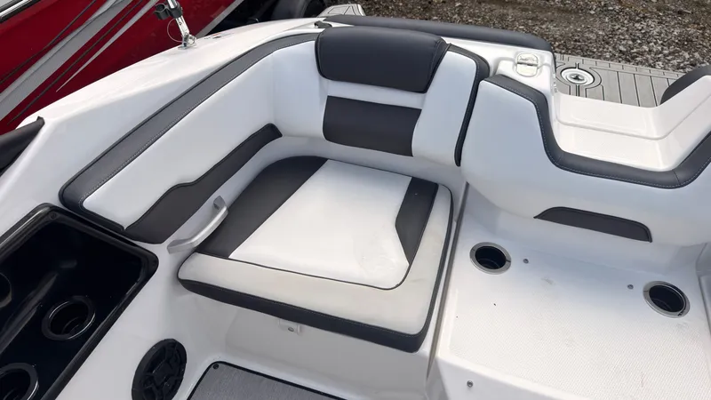 Slide: The Image of The 2026 Yamaha SX195 features a stylish, cushioned seating area with cup holders and modern design. - 8