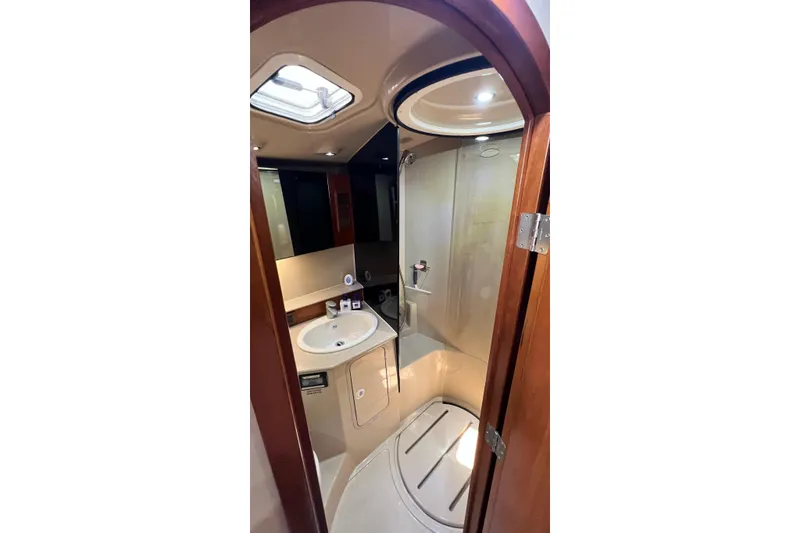 Slide: The Image of Luxurious bathroom in 2005 Rampage 38 Express yacht with shower and sink. - 39