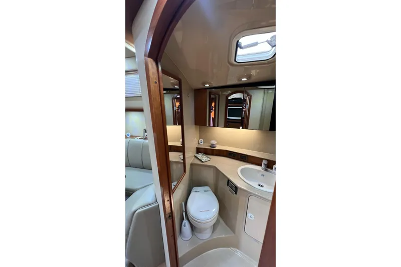 Slide: The Image of Luxurious bathroom interior of 2005 Rampage 38 Express yacht, featuring modern amenities. - 40