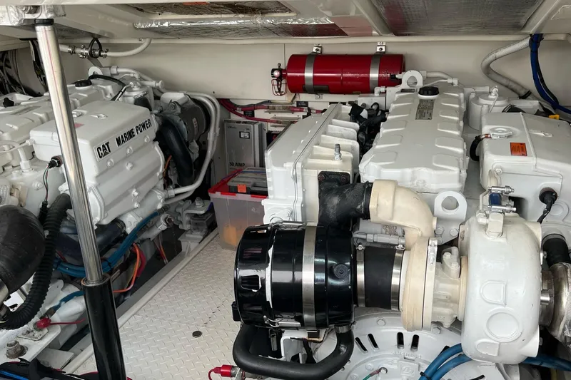 Slide: The Image of Engine room of a 2005 Rampage 38 Express boat with CAT Marine Power engines. - 42