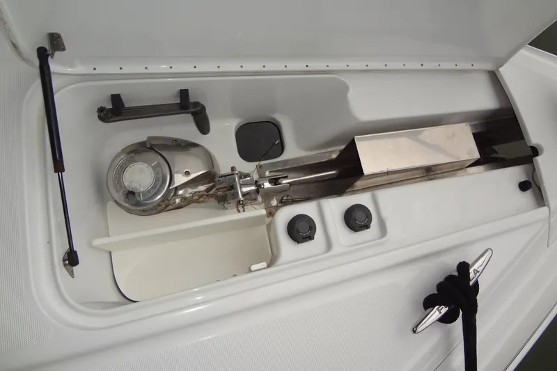 Slide: The Image of 2010 Formula 45 Yacht cruising on a sunny day, blue and white design. - 11