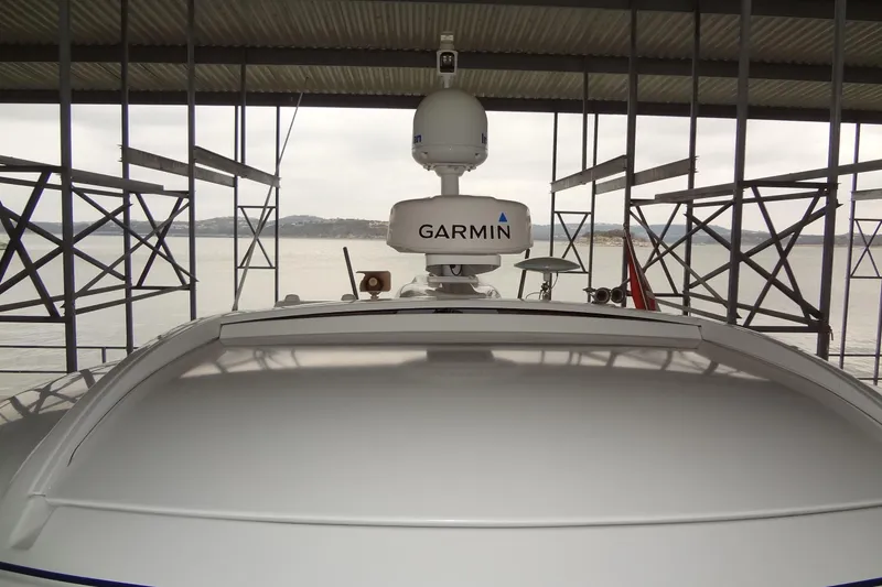 Slide: The Image of 2010 Formula 45 Yacht cruising on a sunny day, blue water and clear sky backdrop. - 13