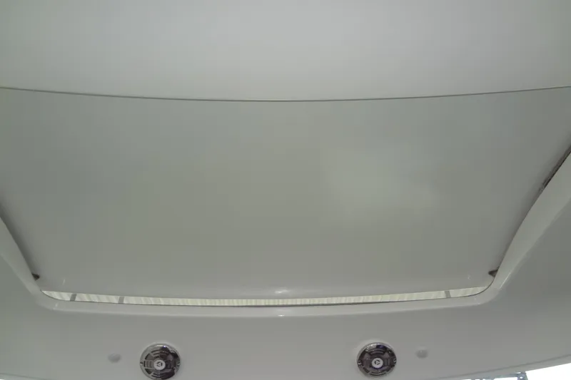 Slide: The Image of 2010 Formula 45 Yacht docked under a metal canopy. - 14