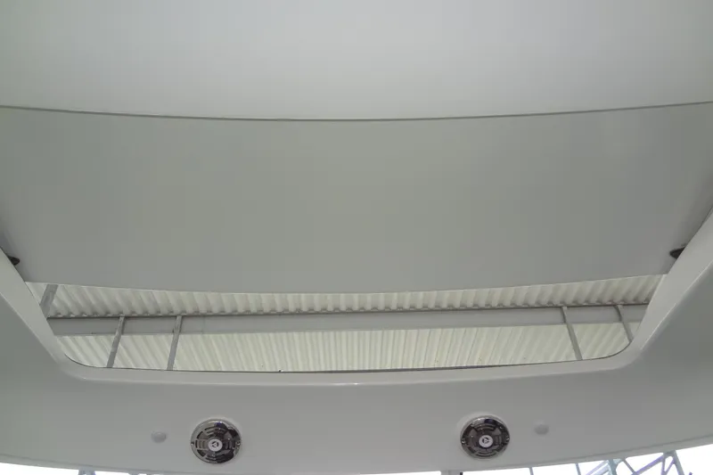 Slide: The Image of 2010 Formula 45 Yacht docked under a covered marina. - 15