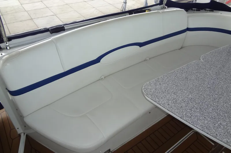 Slide: The Image of 2010 Formula 45 Yacht docked, featuring sleek design and wooden deck. - 20