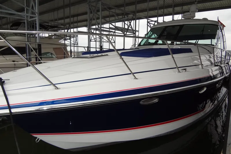 Slide: The Image of 2010 Formula 45 Yacht on serene blue waters under clear sky. - 3