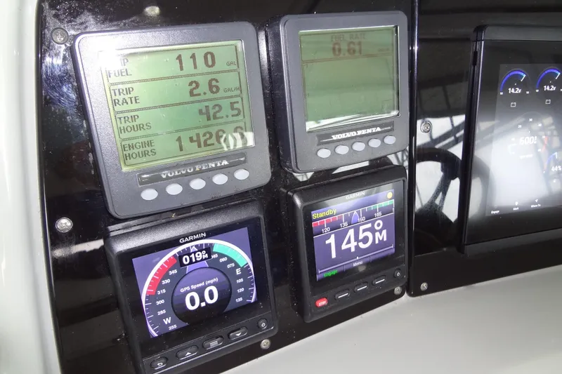 Slide: The Image of Luxurious seating area on a 2010 Formula 45 Yacht with a sleek table design. - 33