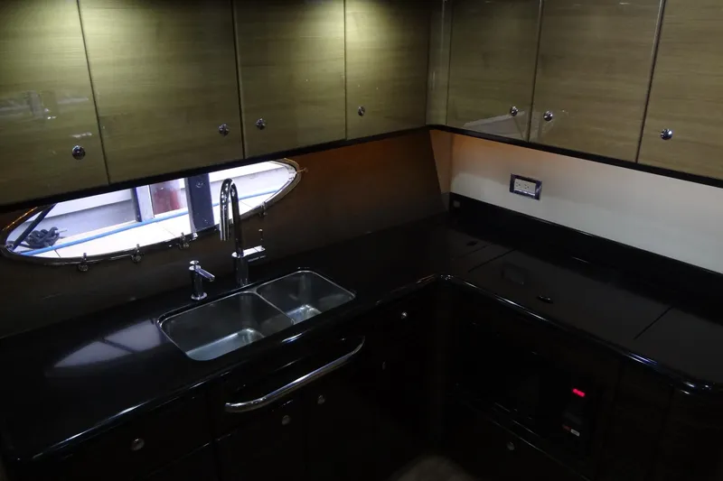 Slide: The Image of Flat-screen TV on 2010 Formula 45 Yacht interior, featuring modern design and lighting. - 40