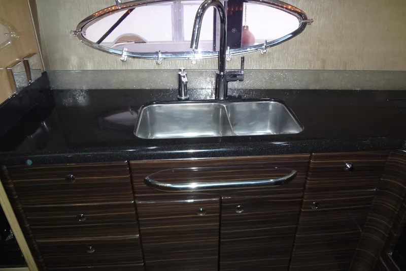 Slide: The Image of 2010 Formula 45 Yacht interior with white seating and modern helm. - 41