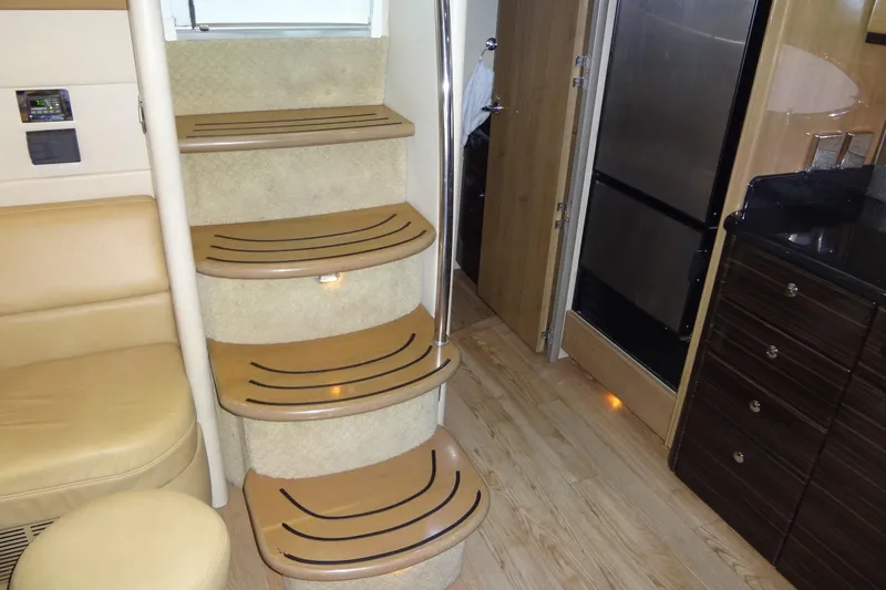 Slide: The Image of Luxury kitchen sink in 2010 Formula 45 Yacht with sleek cabinetry and modern fixtures. - 54
