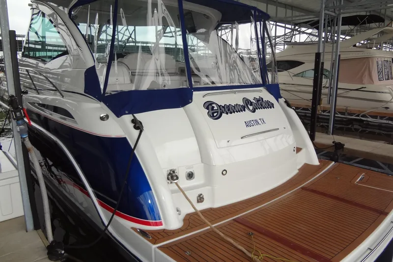 Slide: The Image of 2010 Formula 45 Yacht cruising on a sunny day, blue sky and calm waters. - 7