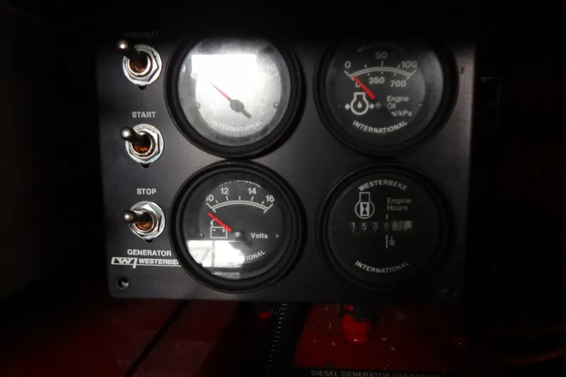 Slide: The Image of Control panel of a 2010 Formula 45 Yacht with Westerbeke generator gauges. - 80