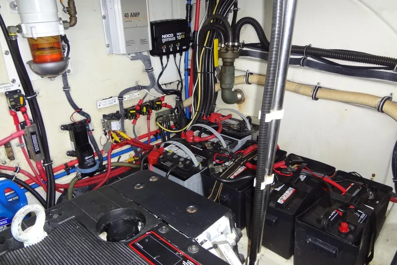 Slide: The Image of Electrical system of a 2010 Formula 45 Yacht, featuring batteries and wiring. - 81