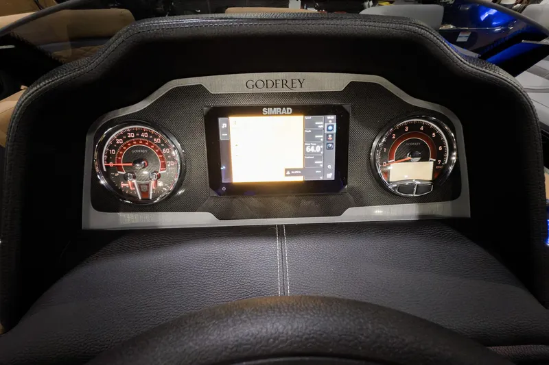 Slide: The Image of Dashboard of 2026 Godfrey Monaco 235 Ultra Lounge with digital display and gauges. - 11