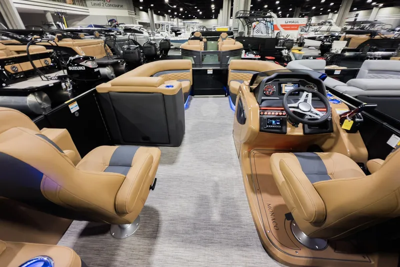 Slide: The Image of 2026 Godfrey Monaco 235 Ultra Lounge interior with luxurious seating and modern dashboard. - 24