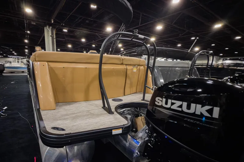 Slide: The Image of 2026 Godfrey Monaco 235 Ultra Lounge with Suzuki engine at indoor boat show. - 3