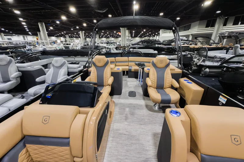 Slide: The Image of 2026 Godfrey Monaco 235 Ultra Lounge boat interior with luxurious seating and modern design. - 7