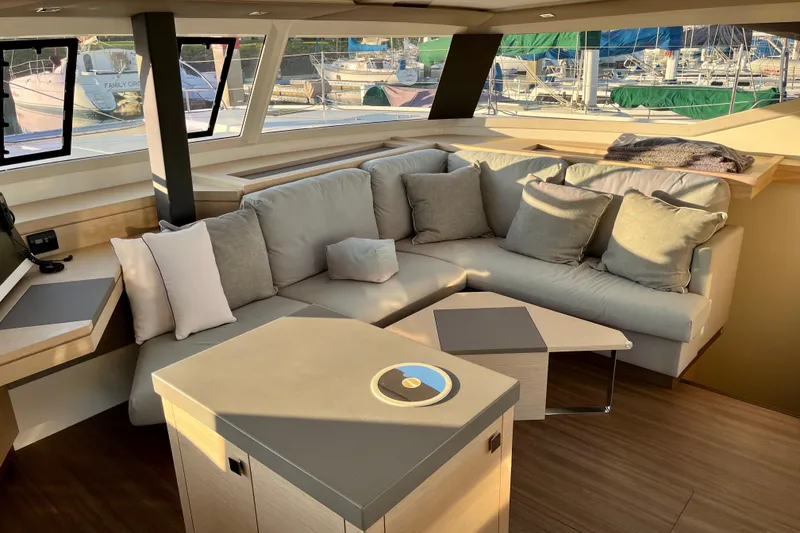 Slide: The Image of Luxurious interior of 2018 Fountaine Pajot Saona catamaran with plush seating and modern decor. - 14