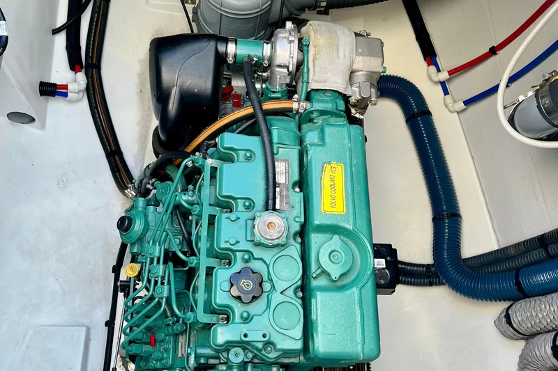 Slide: The Image of Engine compartment of a 2018 Fountaine Pajot Saona catamaran, featuring a Volvo Penta engine. - 20