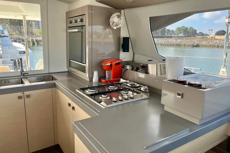 Slide: The Image of Modern kitchen interior of 2018 Fountaine Pajot Saona 47 catamaran with ocean view. - 16