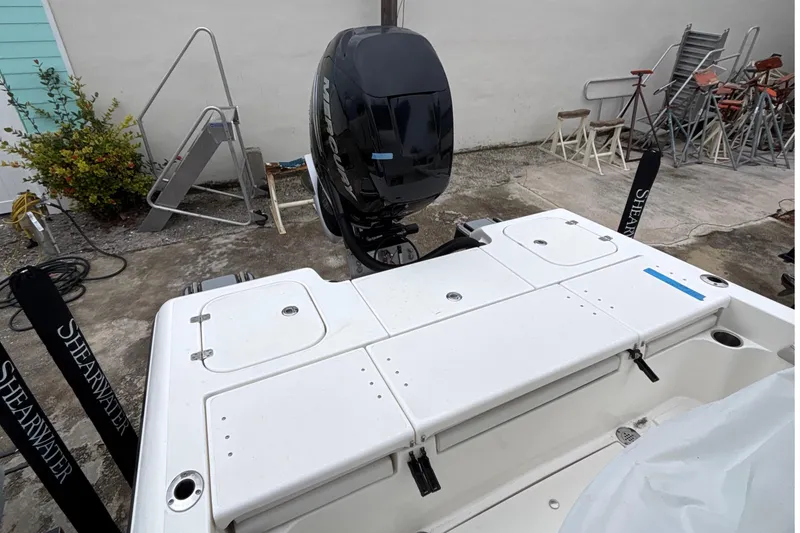 Slide: The Image of 2023 ShearWater 260 SS Carolina boat on water, featuring Mercury 400 engine. - 3