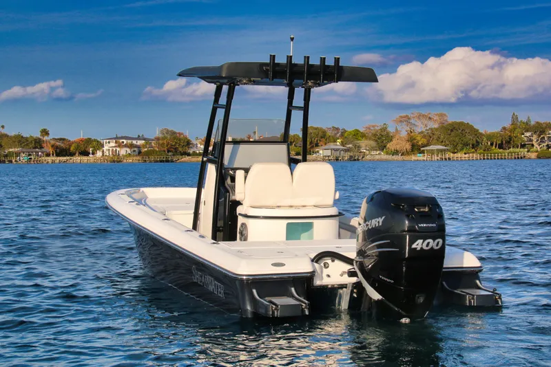 Slide: The Image of 2023 ShearWater 260 SS Carolina boat on water with Mercury 400 engine. - 5