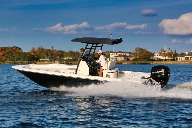 Slide: The Image of 2023 ShearWater 260 SS Carolina boat cruising on a sunny day. - 8