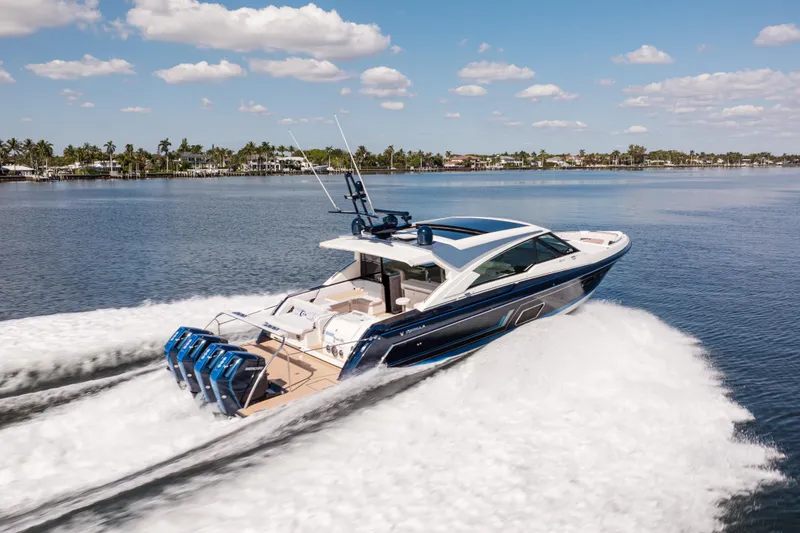 The Image of 2022 Formula 500 Super Sport Crossover cruising on a sunny day, showcasing sleek design and power. - 0