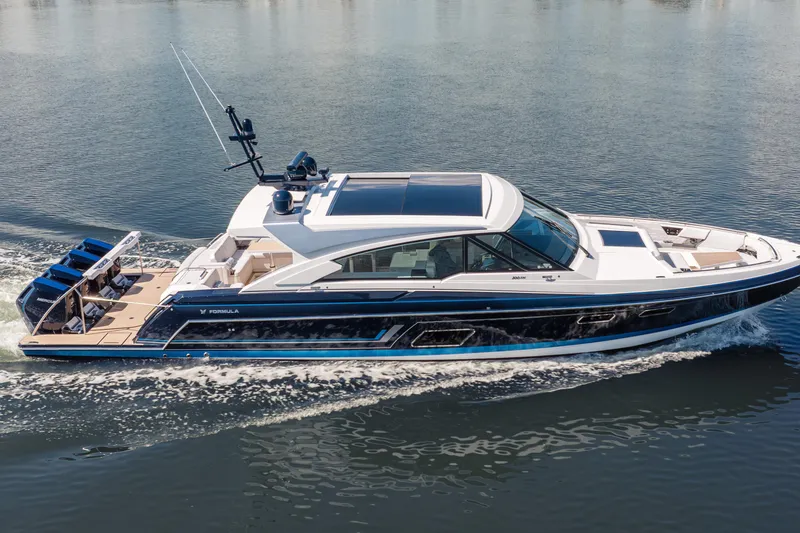 Slide: The Image of 2022 Formula 500 Super Sport Crossover yacht cruising on calm water. - 10