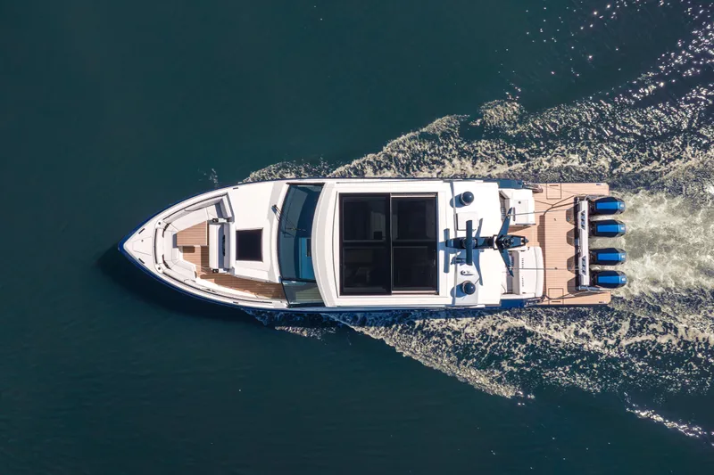 Slide: The Image of Aerial view of 2022 Formula 500 Super Sport Crossover yacht cruising on water. - 12