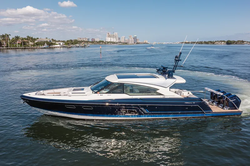 Slide: The Image of 2022 Formula 500 Super Sport Crossover yacht cruising on a sunny day. - 13