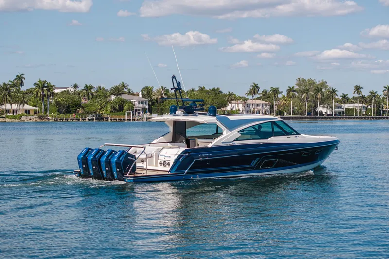 Slide: The Image of 2022 Formula 500 Super Sport Crossover boat cruising on a sunny day. - 16