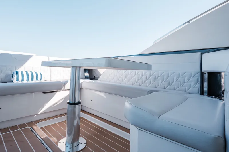 Slide: The Image of Luxurious interior of 2022 Formula 500 Super Sport Crossover yacht with elegant seating and table. - 20