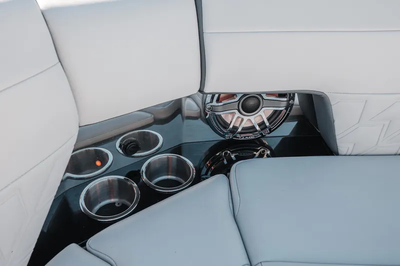 Slide: The Image of 2022 Formula 500 Super Sport Crossover interior with cup holders and speaker system. - 25