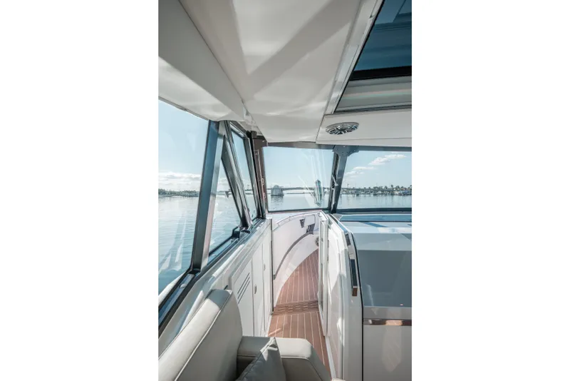 Slide: The Image of Interior view of 2022 Formula 500 Super Sport Crossover yacht with sleek design and panoramic windows. - 29
