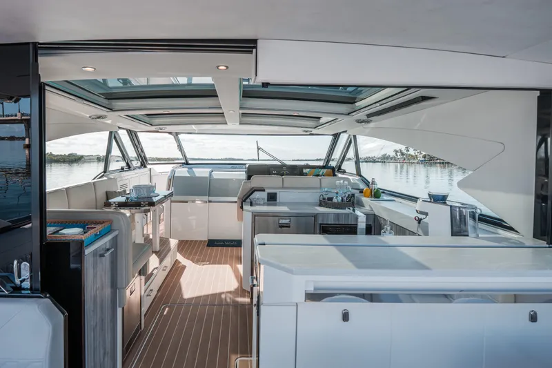 Slide: The Image of Luxurious interior of 2022 Formula 500 Super Sport Crossover yacht with panoramic windows. - 32