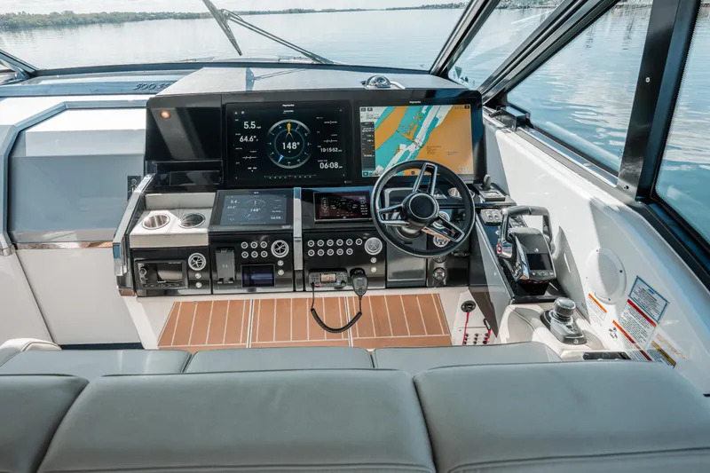 Slide: The Image of 2022 Formula 500 Super Sport Crossover helm with advanced navigation displays and controls. - 33