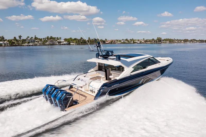 Slide: The Image of 2022 Formula 500 Super Sport Crossover cruising on a sunny day. - 4