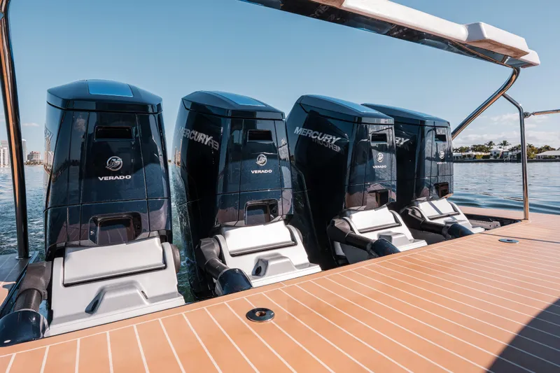 Slide: The Image of 2022 Formula 500 Super Sport Crossover with four Mercury Verado outboard engines on water. - 47