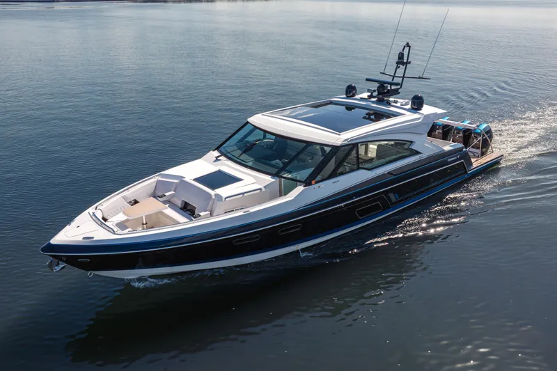 Slide: The Image of 2022 Formula 500 Super Sport Crossover cruising on calm water. - 8